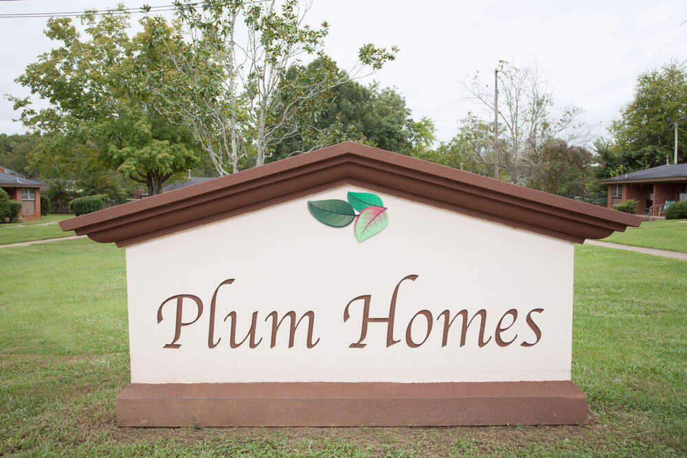Plum Homes Sign 