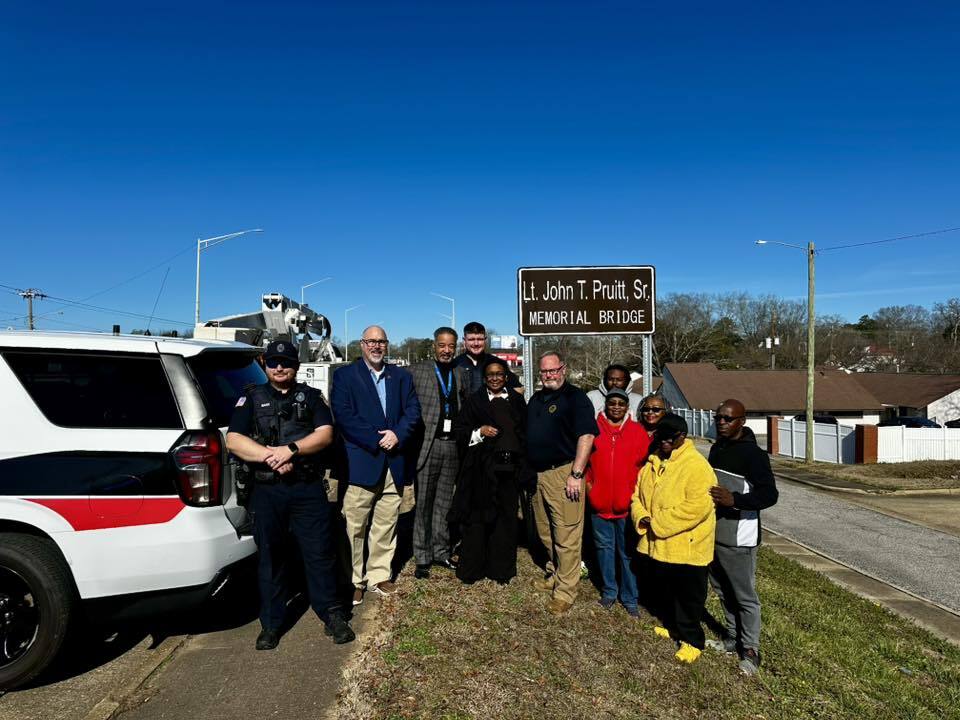 Opelika Police and Housing Authority staff at the Pruitt bridge